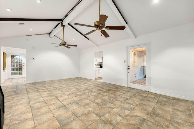 empty room with ceiling fan and vaulted ceiling with beams