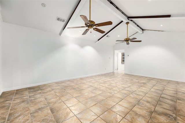 unfurnished room featuring vaulted ceiling with beams