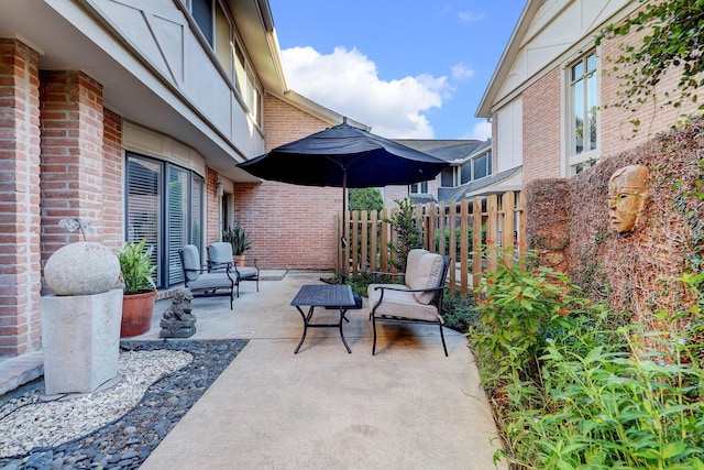 view of patio / terrace with fence