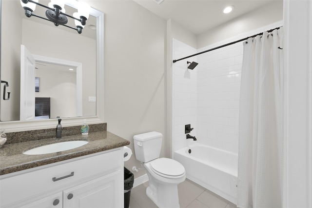 bathroom with toilet, tile patterned floors, an inviting chandelier, shower / bathtub combination with curtain, and vanity