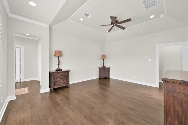 interior space with dark wood-type flooring, visible vents, and baseboards