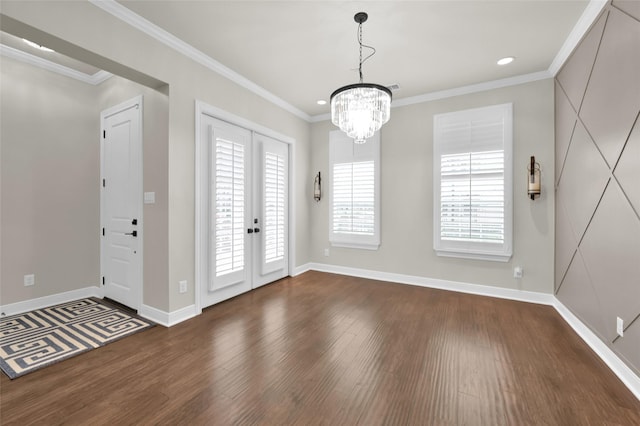 entrance foyer featuring baseboards, dark wood-style flooring, and crown molding