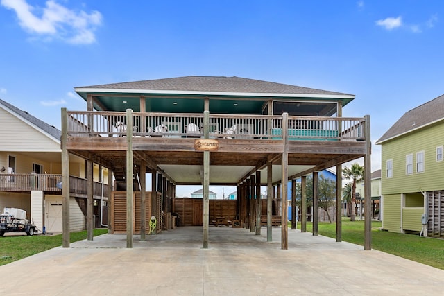 rear view of house featuring a carport