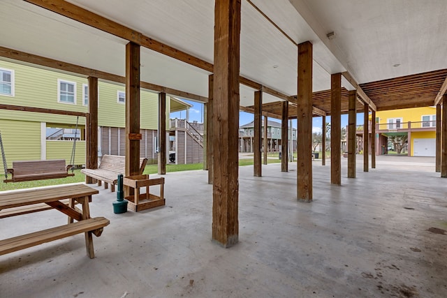 interior space featuring concrete flooring