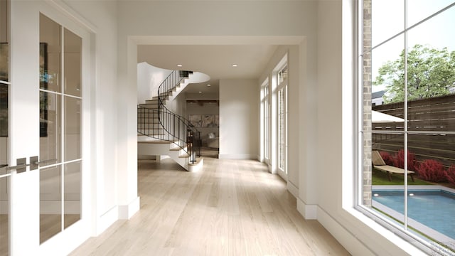 2002 Park St, Houston, TX 77019 - hallway with wood finished floors, stairs, and baseboards