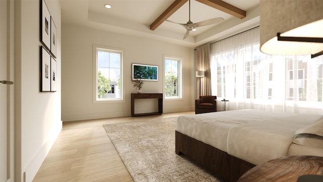 bedroom with ceiling fan, beamed ceiling, and light hardwood / wood-style floors