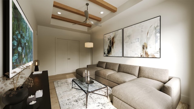 living room with beam ceiling, ceiling fan, and hardwood / wood-style floors