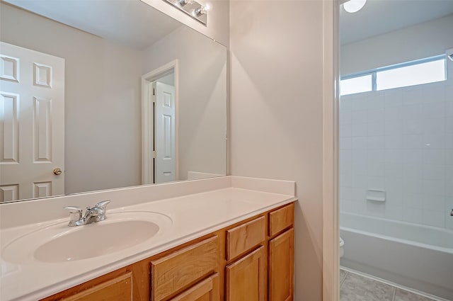 bathroom with toilet, tile patterned flooring, tub / shower combination, and vanity