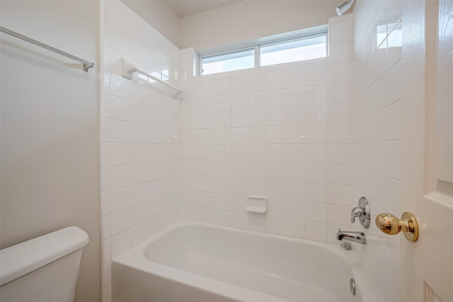 full bathroom with bathing tub / shower combination and toilet