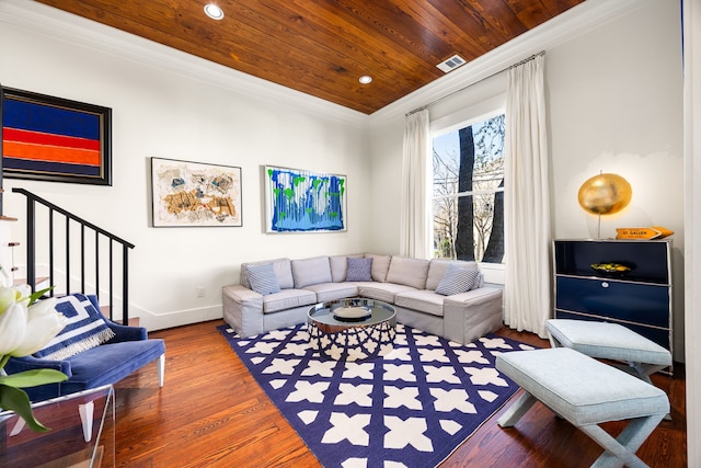 living room featuring recessed lighting, wood finished floors, wood ceiling, baseboards, and ornamental molding