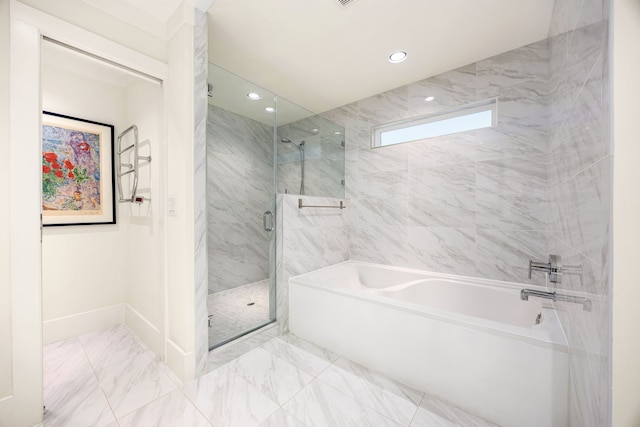 full bathroom featuring marble finish floor, a marble finish shower, a bath, and recessed lighting