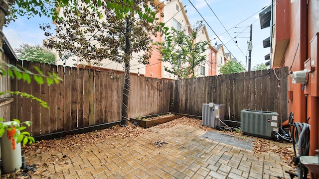 view of patio with central AC