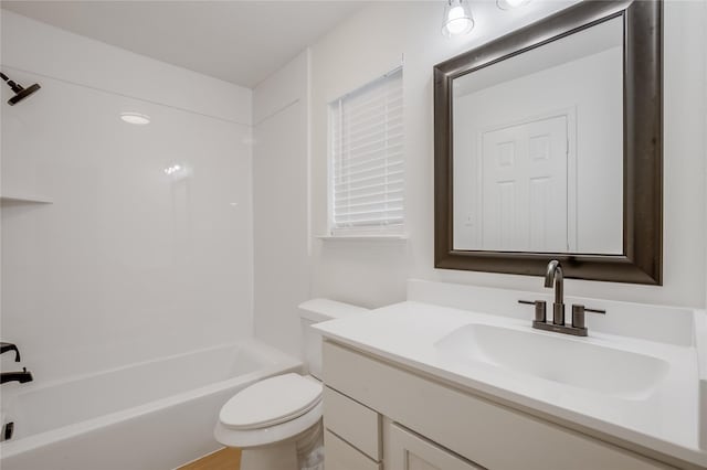 full bathroom with bathing tub / shower combination, vanity, and toilet