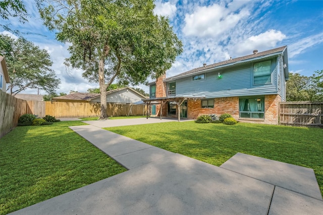 8619 Quail Burg Ln, Houston, TX 77489 - back of house featuring a patio and brick siding