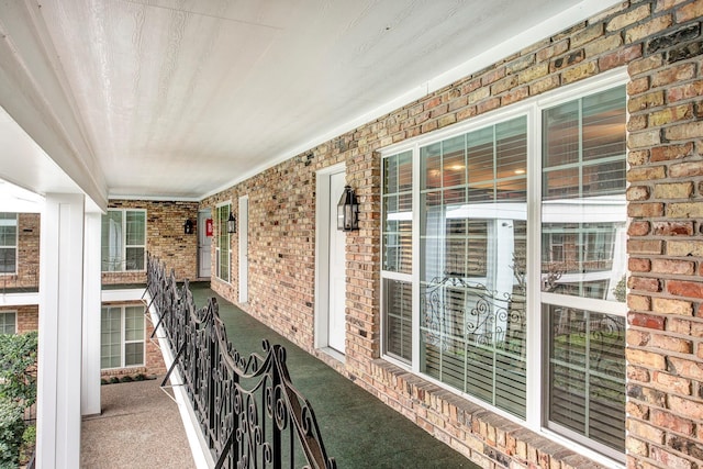 balcony featuring covered porch