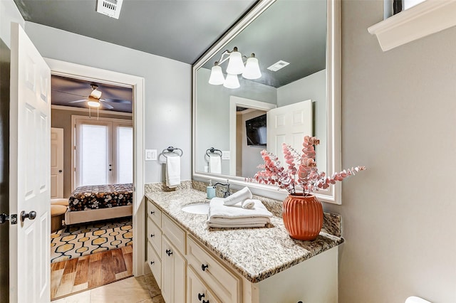 bathroom with vanity and ceiling fan