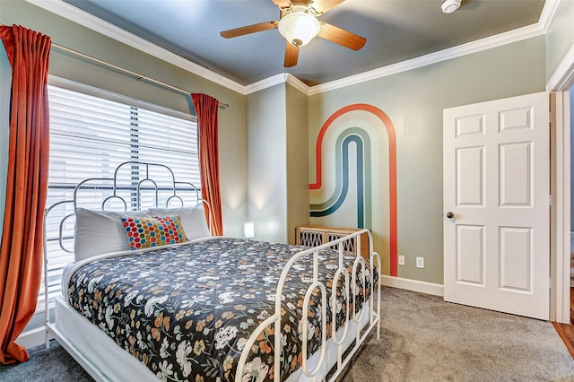 carpeted bedroom featuring ceiling fan and crown molding