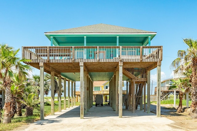 exterior space featuring a carport