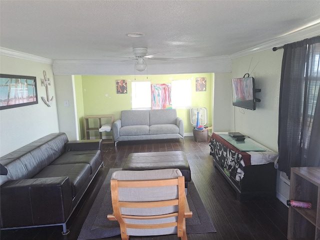 living room featuring ceiling fan, a textured ceiling, dark hardwood / wood-style flooring, and ornamental molding