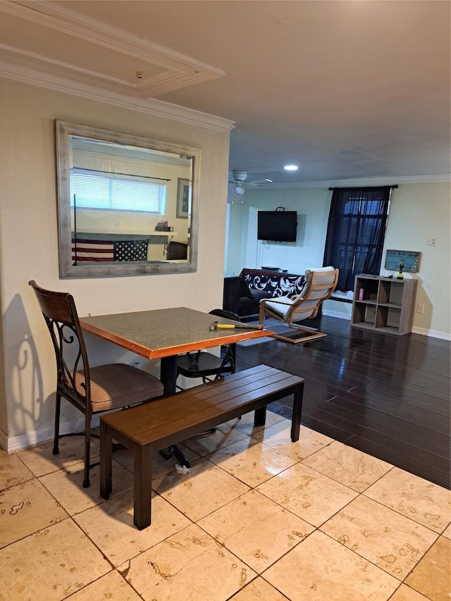 dining area featuring ceiling fan, light tile patterned flooring, and crown molding