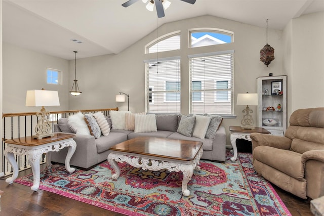 living room with ceiling fan, lofted ceiling, and dark hardwood / wood-style flooring