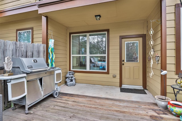 entrance to property with a deck