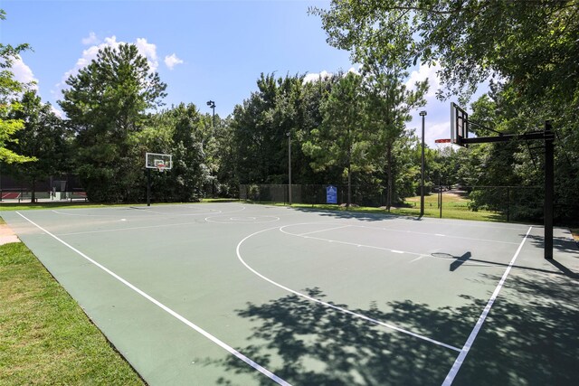 150 Cheswood Forest Dr, Montgomery, TX 77316 - view of sport court featuring community basketball court and fence