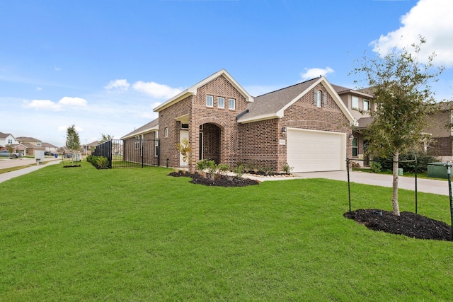 view of front of property with a front lawn and a garage