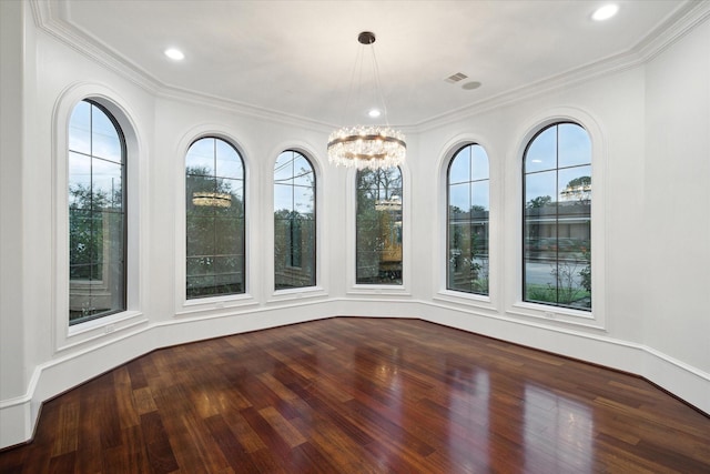 unfurnished sunroom with a chandelier