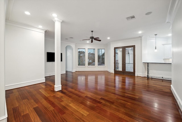 unfurnished living room with french doors, ceiling fan, decorative columns, and dark hardwood / wood-style floors