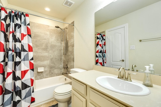 full bathroom featuring vanity, toilet, and shower / bath combo