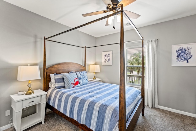 bedroom with dark carpet and ceiling fan