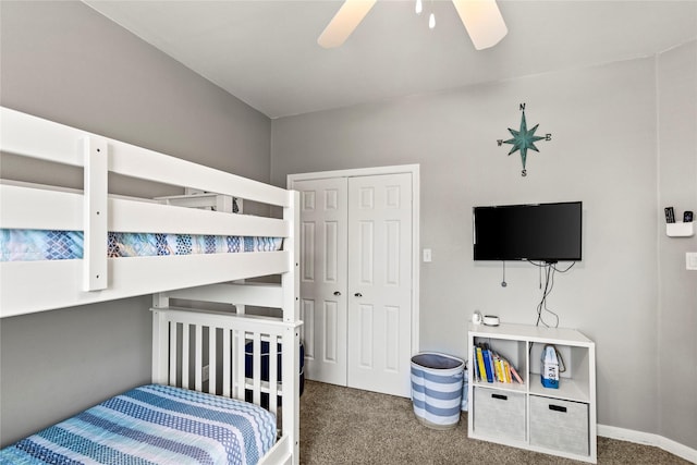 carpeted bedroom featuring a closet and ceiling fan