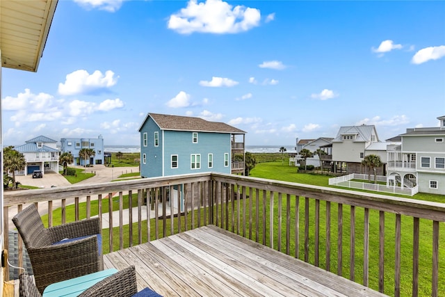 wooden terrace with a yard