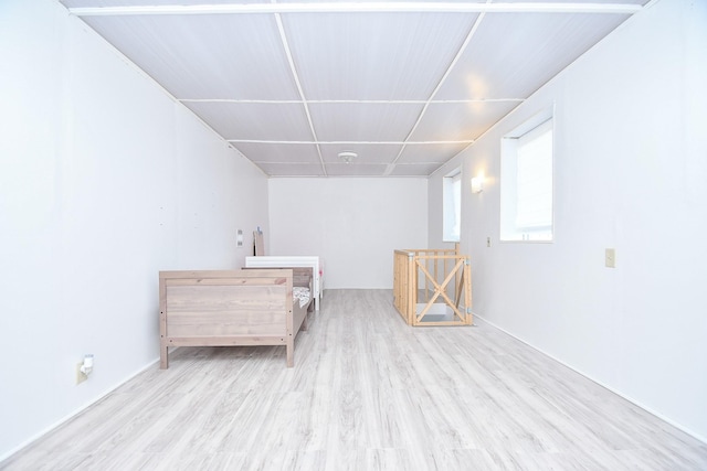 basement featuring light hardwood / wood-style flooring