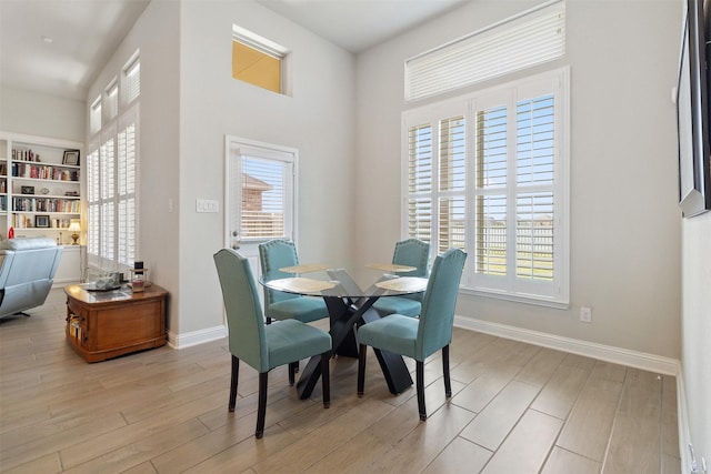 dining room featuring light hardwood / wood-style floors