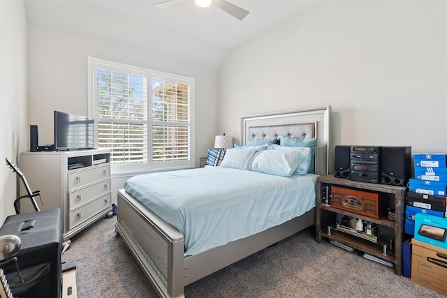 carpeted bedroom with vaulted ceiling and ceiling fan