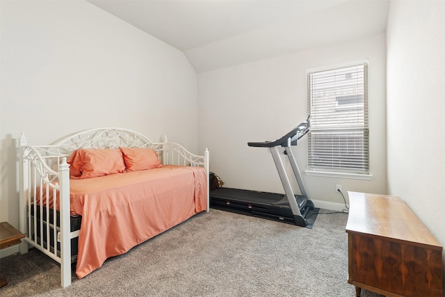 carpeted bedroom with vaulted ceiling