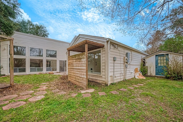 view of outdoor structure with a lawn