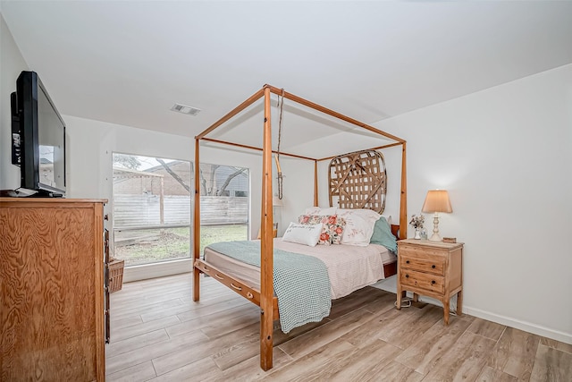 bedroom featuring light hardwood / wood-style flooring