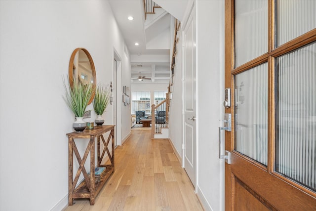 entryway featuring light wood-style floors, recessed lighting, stairway, and baseboards