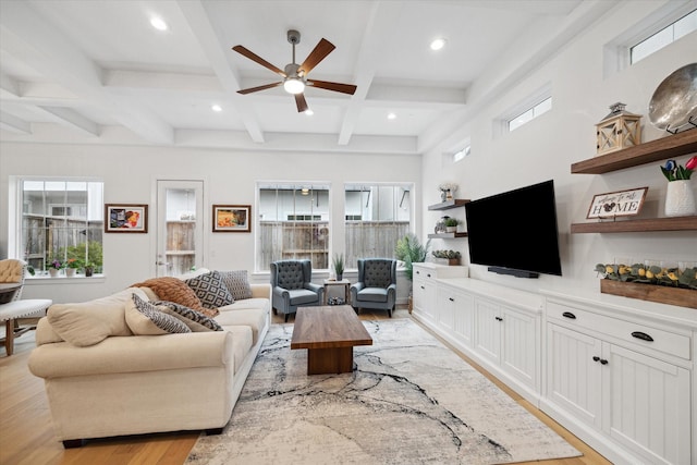 living room with beam ceiling, recessed lighting, light wood-style floors, a ceiling fan, and coffered ceiling