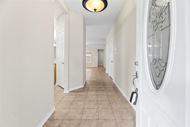 foyer featuring light tile patterned floors