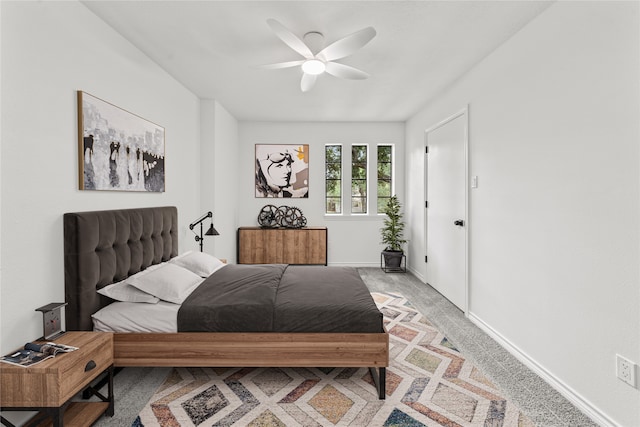 bedroom featuring ceiling fan and carpet flooring