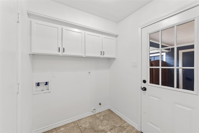 washroom with cabinets, hookup for a gas dryer, hookup for a washing machine, and electric dryer hookup