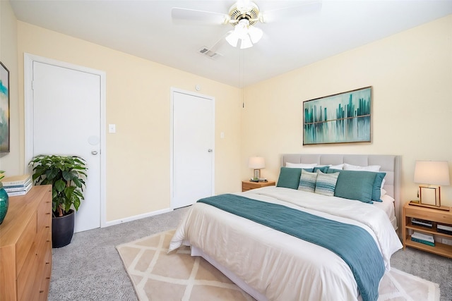 carpeted bedroom with ceiling fan