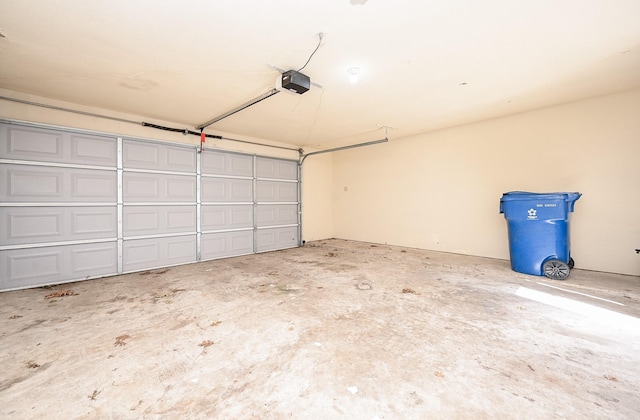 garage featuring a garage door opener