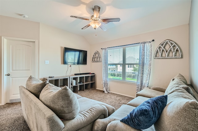 living room with lofted ceiling, carpet, a ceiling fan, and baseboards