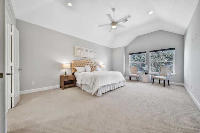 bedroom with light carpet, baseboards, vaulted ceiling, and a ceiling fan