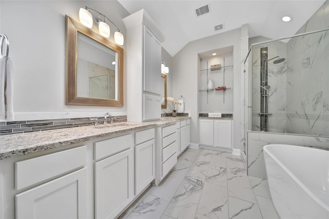 full bath featuring a marble finish shower, visible vents, a soaking tub, marble finish floor, and vanity